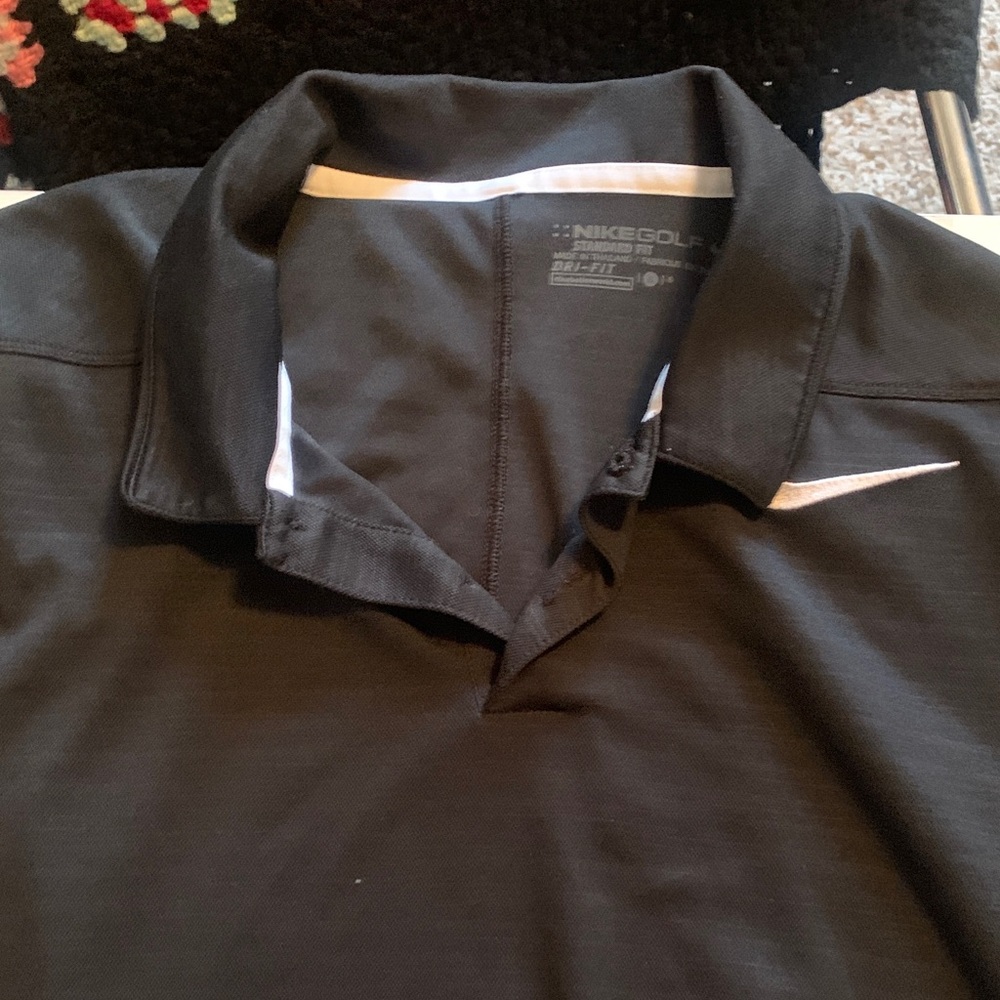 Nike Men's Black Polo Shirt with White Accents